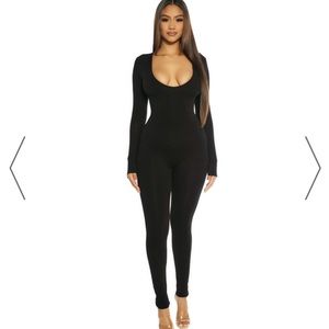 THE NW DEEP V JUMPSUIT size medium, only tried on once but didn’t wear for long